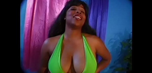  Long-haired black babe with teardrop tits bends over for doggy-style reaming
